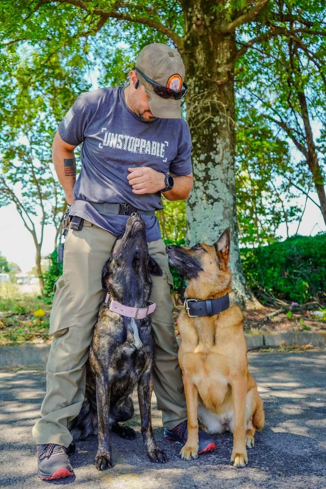 Rick with two working K9s in Huntsville